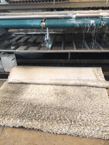ניקוי שטיח במפעל